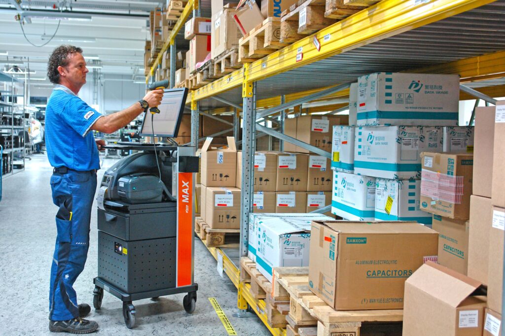 worker stacking a warehouse